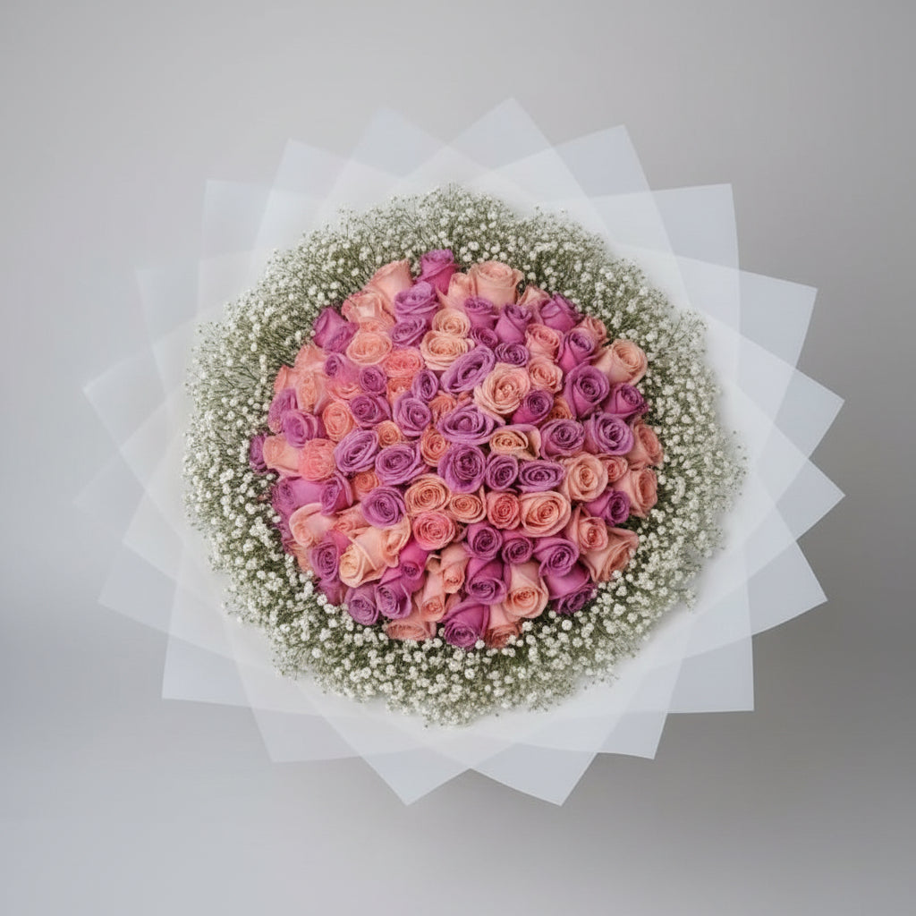 100 ROSAS DE COLOR CON PAPEL DE DISEÑO Y FOLLAJE