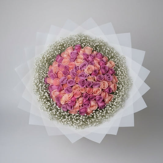 100 ROSAS DE COLOR CON PAPEL DE DISEÑO Y FOLLAJE