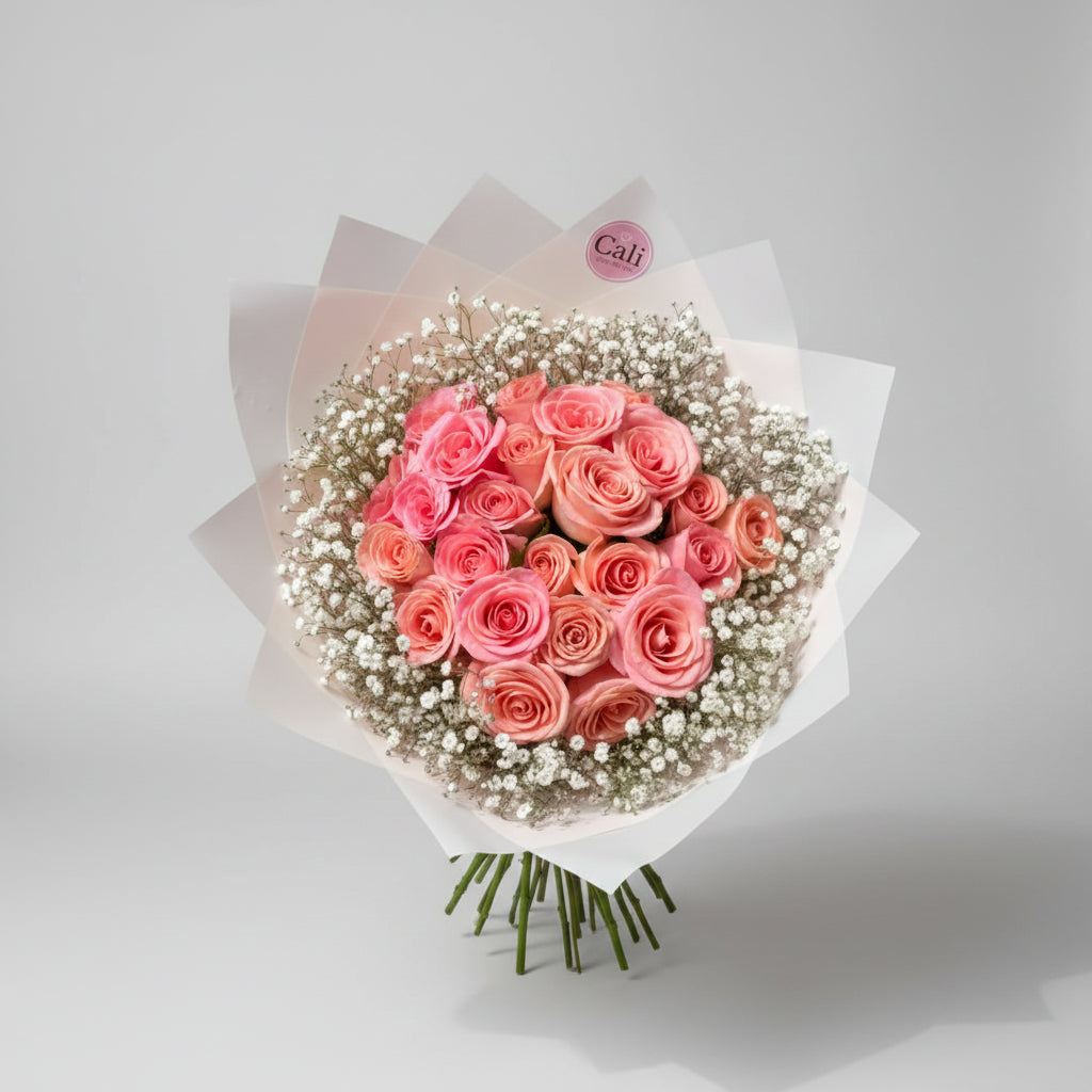 24 ROSAS DE COLOR CON PAPEL DE DISEÑO Y FOLLAJE